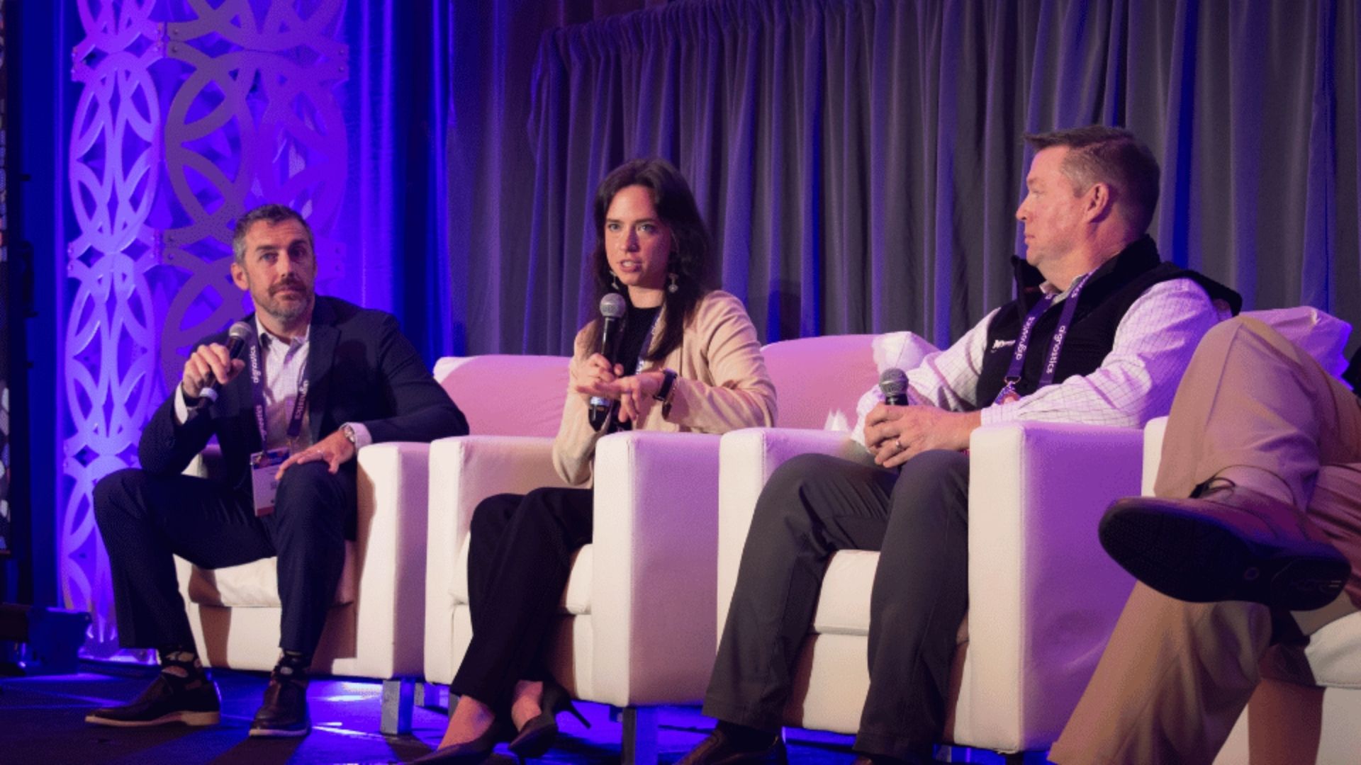 Image of speakers onstage discussing